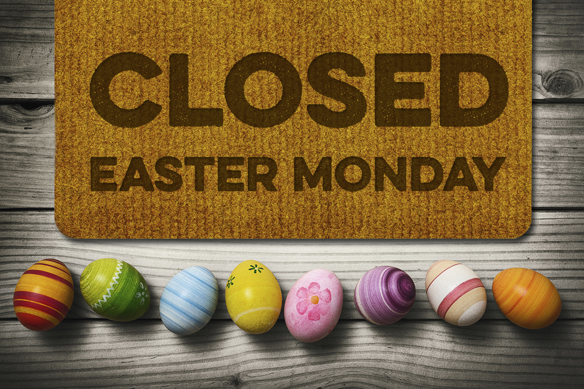 Easter Eggs Underneath a Brown Mat That States "Closed Easter Monday"